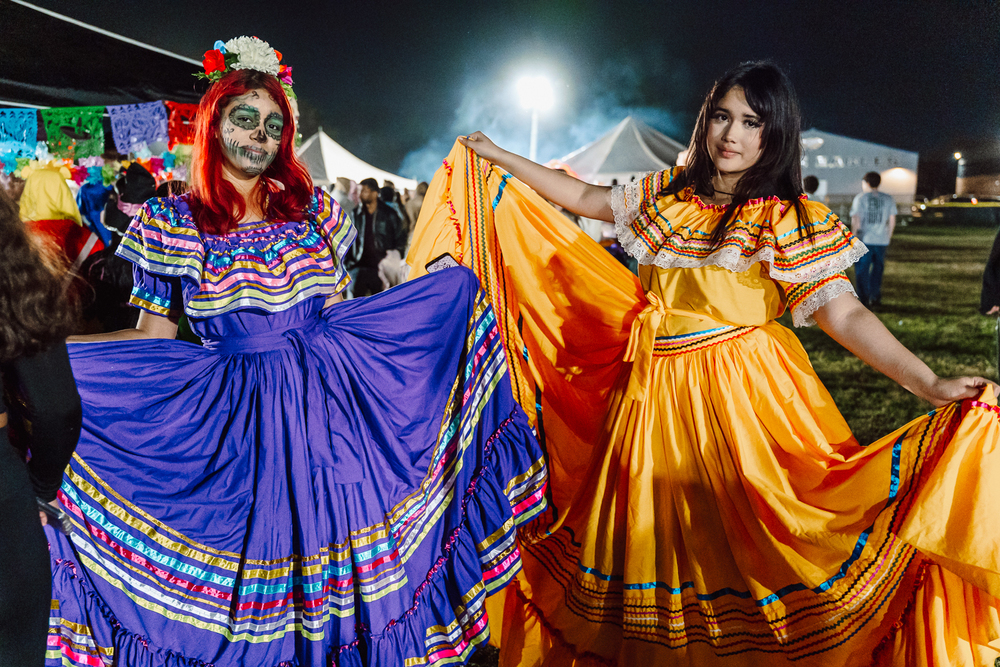 Students dressed in traditional cultural clothing for holiday.