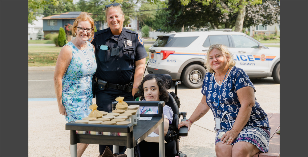 4 people one being a cop outdoors