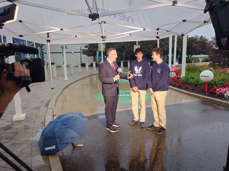 Rich Hoffman, News 12 Meteorologist interviewing Aaryan Rupesh and Matthew Tusa