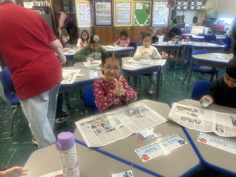 Grade One making Oobleck.