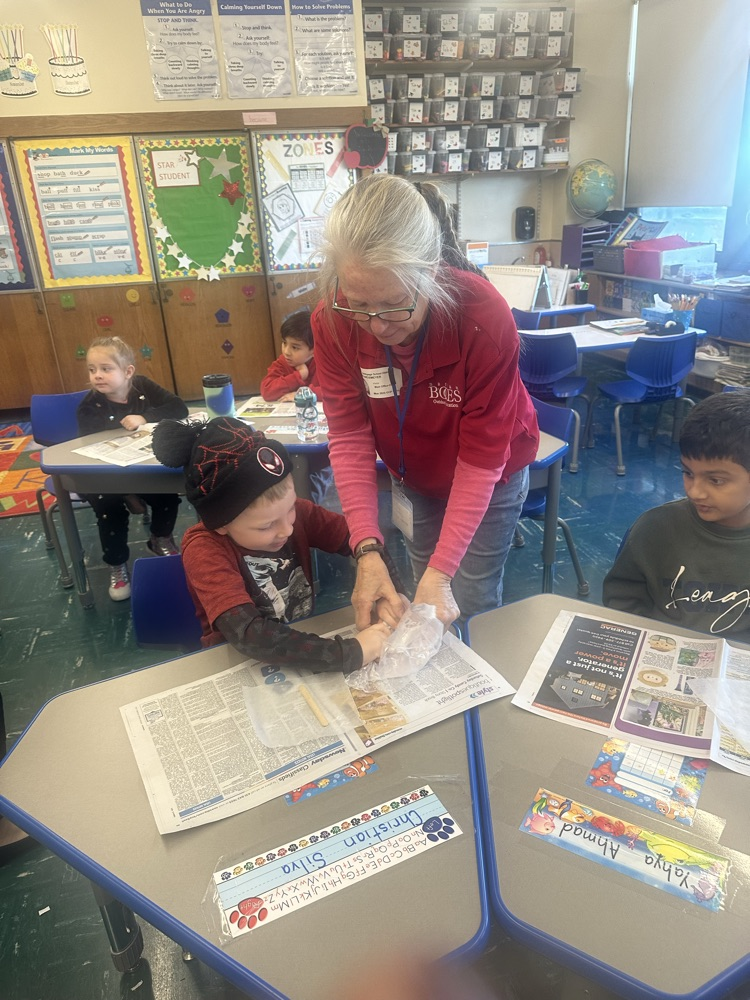 Grade One making Oobleck.