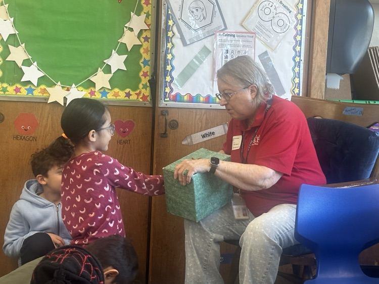 Grade One making Oobleck.