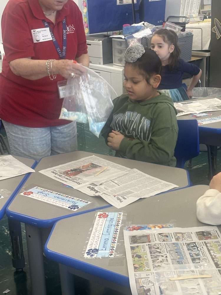 Grade One making Oobleck.