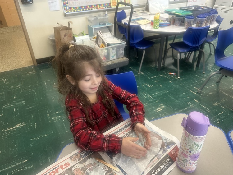 Grade One making Oobleck.
