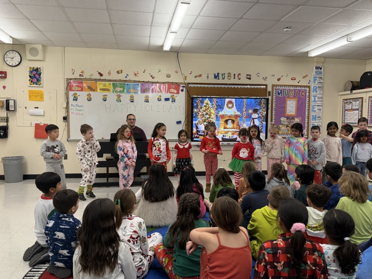 Kindergarteners performing holiday songs.