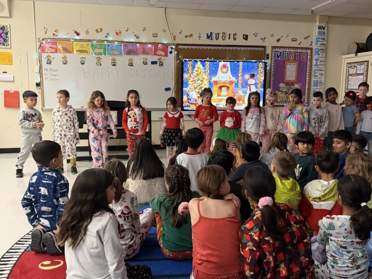 Kindergarteners performing holiday songs