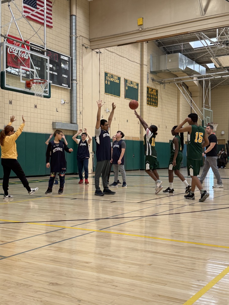 Bethpage playing defense in challenger basketball