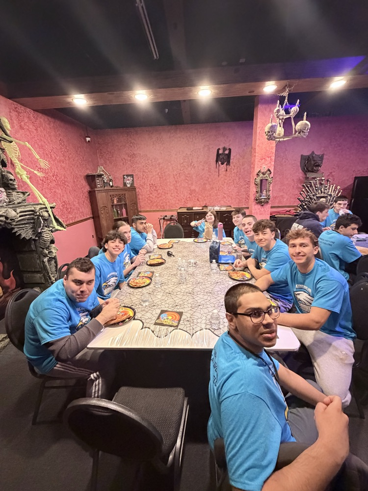 buddies sitting at decorated table