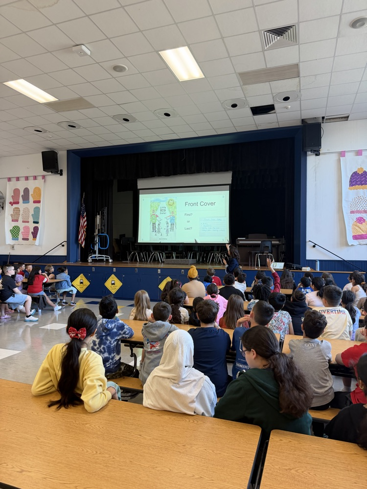 Amy McCoy author visit presenting to students 