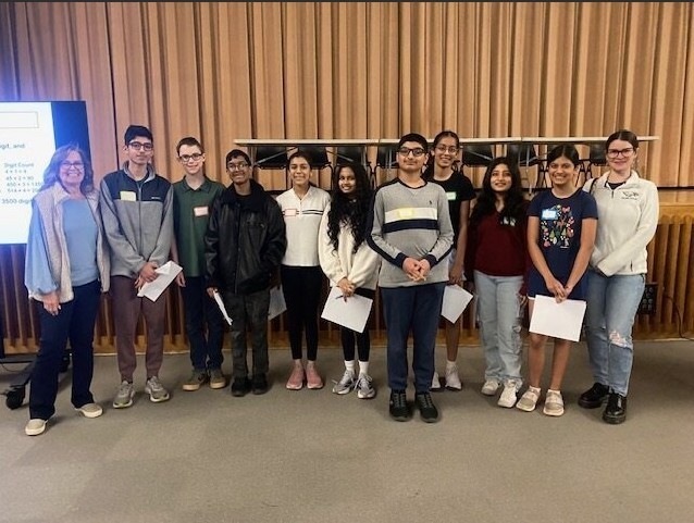 Aditi Sujin, Afraz Abyan,  Niyumi Wijesundara, Hamza  Shakeel, James Johnson, Rizwan Jamil, Minahil Nasar, Diyaa Shah, and  Ayana Garg.    These students represented JFK at the Annual Kellenberg Math Tournament on Tuesday. Pictured with Mrs. O'Sullivan and Ms. Tekverk