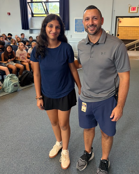 Mr. Ierano and 7th grade assembly winner