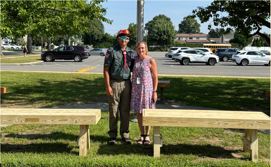 Jaskaran Minhas, BHS Senior built two benches for JFK Middle School as part of his Eagle Scout project. Pictured her with middle school principal Erin Hayes