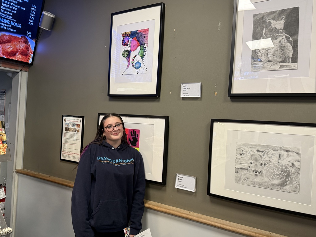 Bethpage Student with Artwork At Mario's Pizzeria