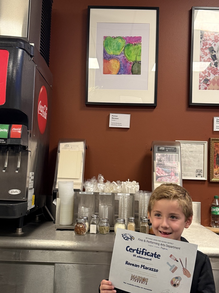 Bethpage Student with Artwork At Mario's Pizzeria