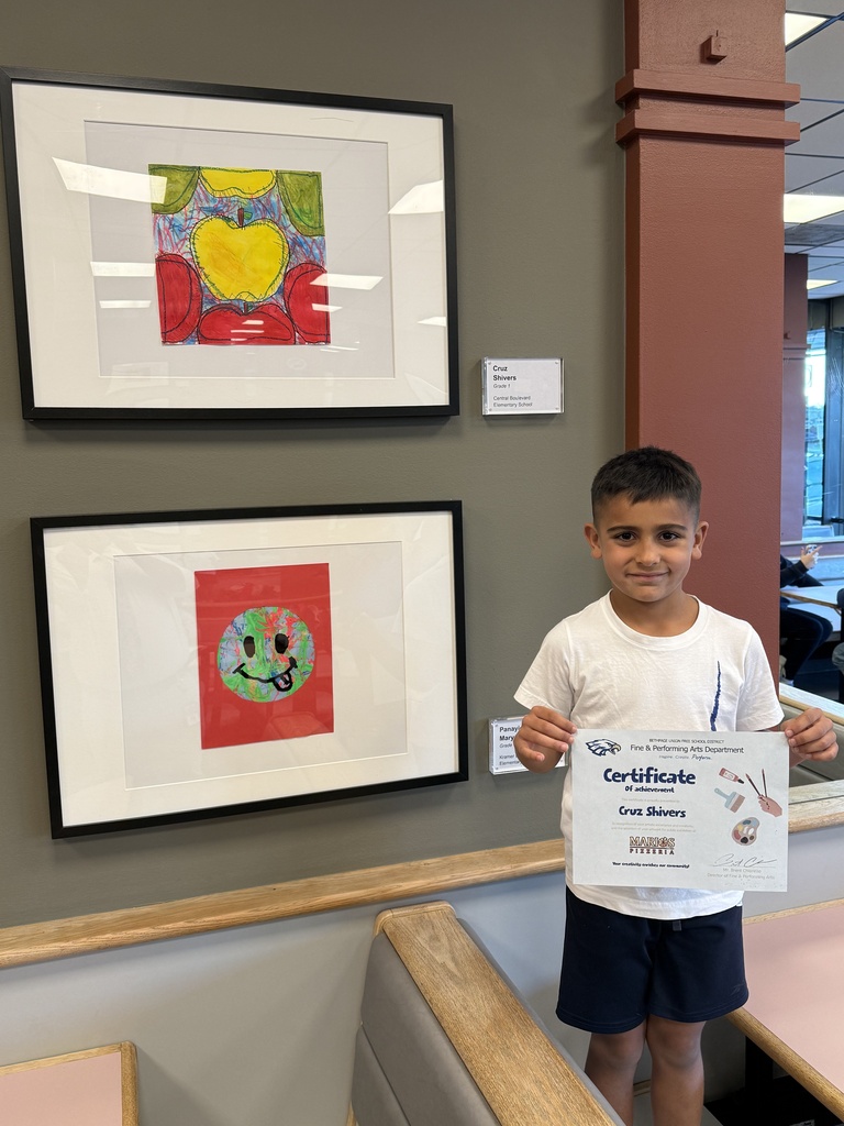 Bethpage Student with Artwork At Mario's Pizzeria