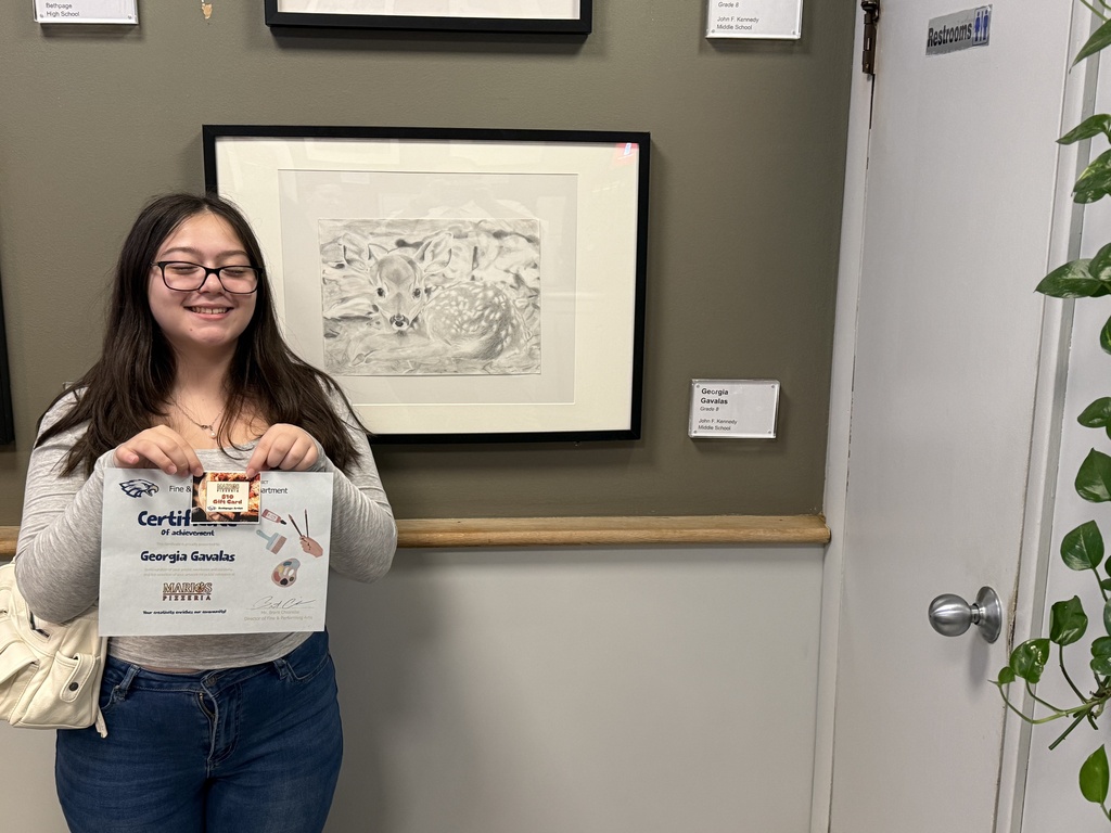 Bethpage Student with Artwork At Mario's Pizzeria