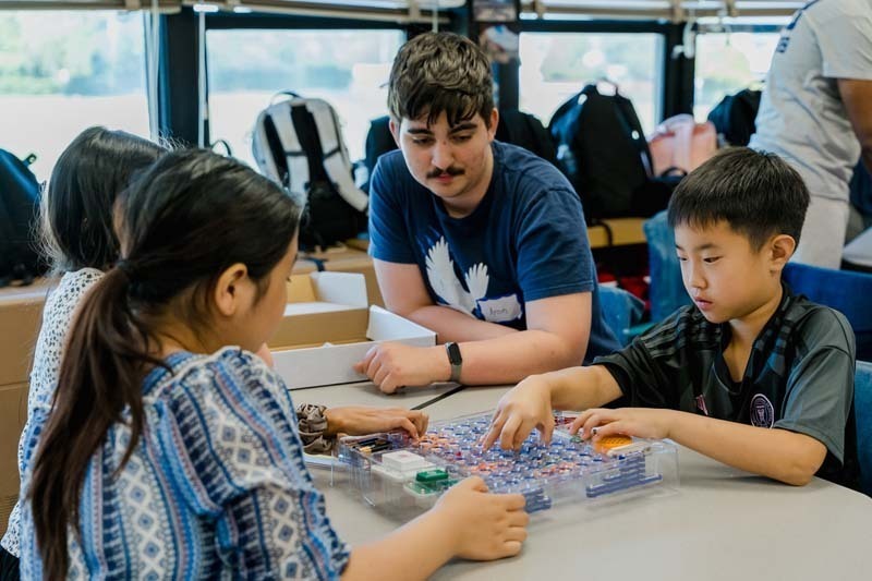On May 20, six members of Bethpage High School’s award-winning robotics team, the Regal Eagles, visited Kramer Lane Elementary School to lead a series of engineering workshops for fifth grade students.