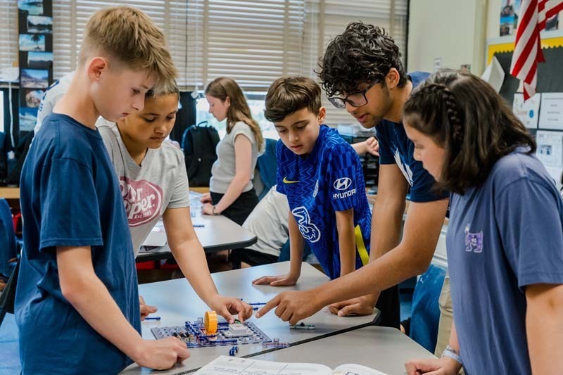 On May 20, six members of Bethpage High School’s award-winning robotics team, the Regal Eagles, visited Kramer Lane Elementary School to lead a series of engineering workshops for fifth grade students.