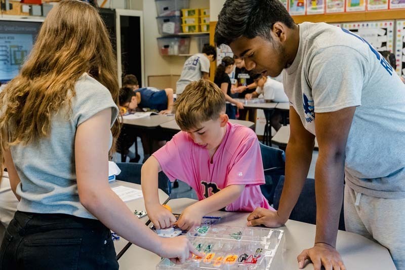 On May 20, six members of Bethpage High School’s award-winning robotics team, the Regal Eagles, visited Kramer Lane Elementary School to lead a series of engineering workshops for fifth grade students.