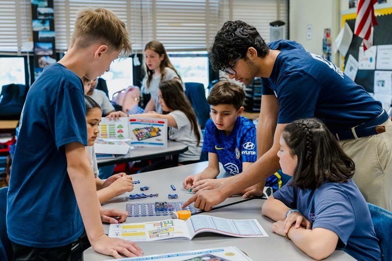 On May 20, six members of Bethpage High School’s award-winning robotics team, the Regal Eagles, visited Kramer Lane Elementary School to lead a series of engineering workshops for fifth grade students.