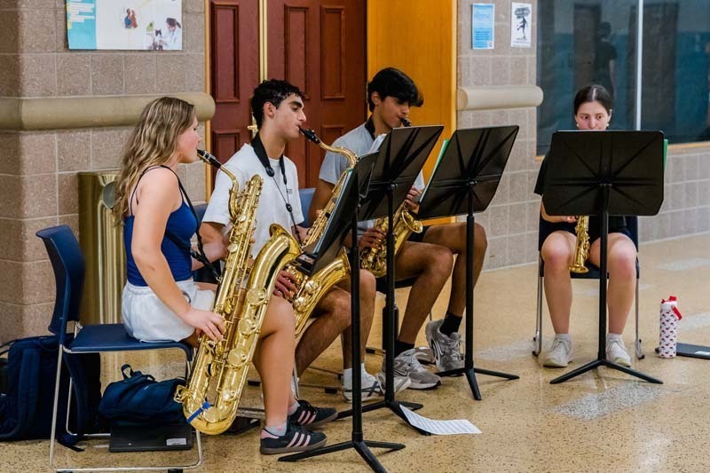 Students playing brass instruments.
