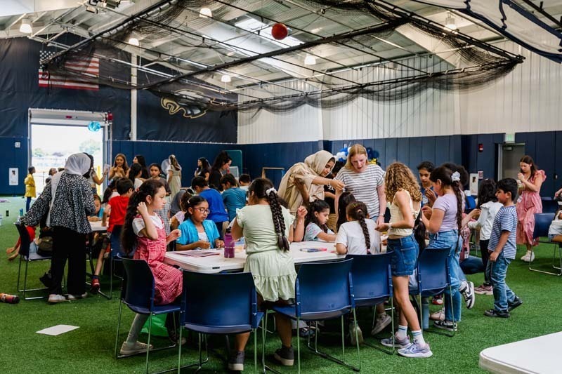 Students from the English Language Learners (ELL) program gathered for a special end-of-year celebration at the Bethpage High School Athletic Barn.
