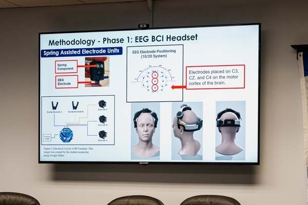 BHS junior demonstrates mind-controlled exoskeleton at board meeting