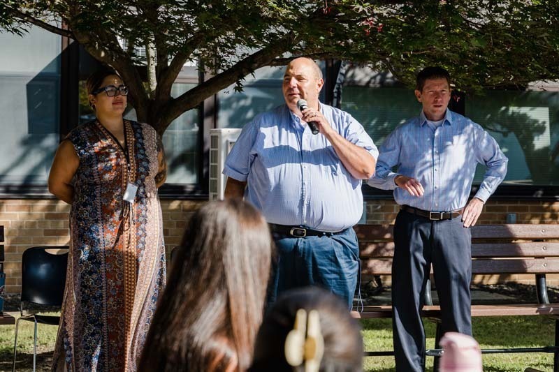Teachers outside during event.