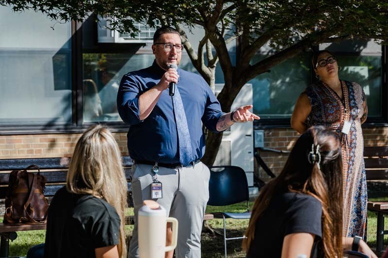 Teachers outside during event.