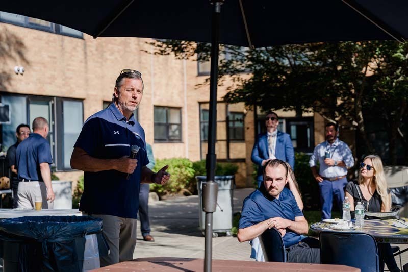 Teachers outside during event.