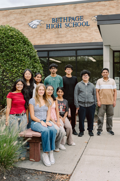 Group of people posing outdoors