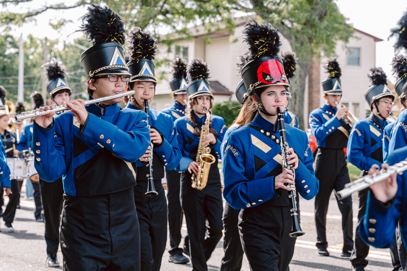 Marching band performing on street