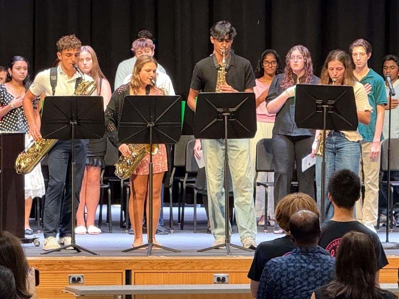 Student band playing on stage.