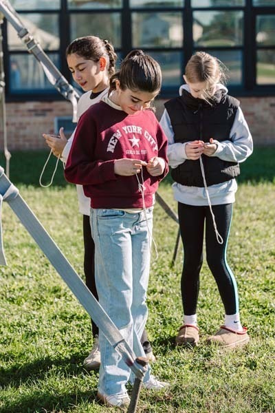 Students working together outside.