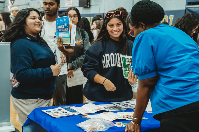Students at College Fair Booths
