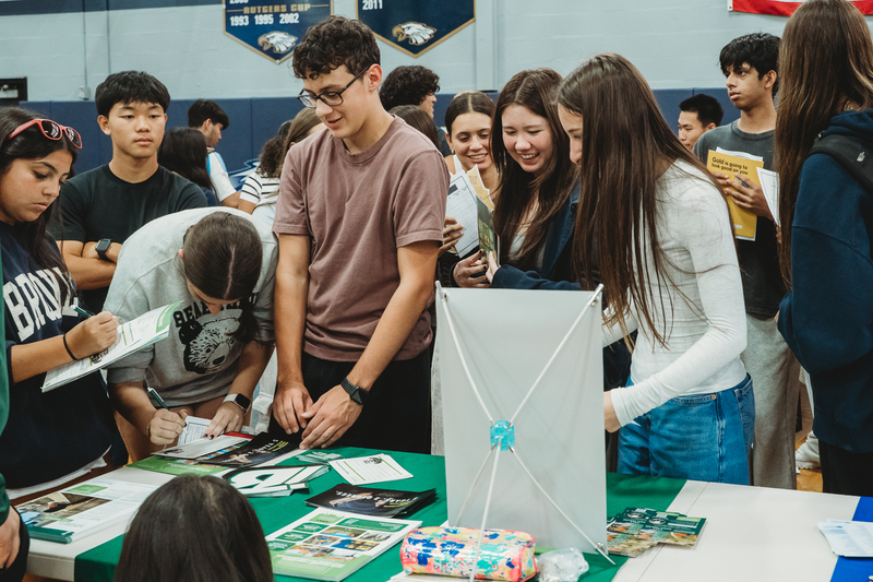 Students at College Fair Booths