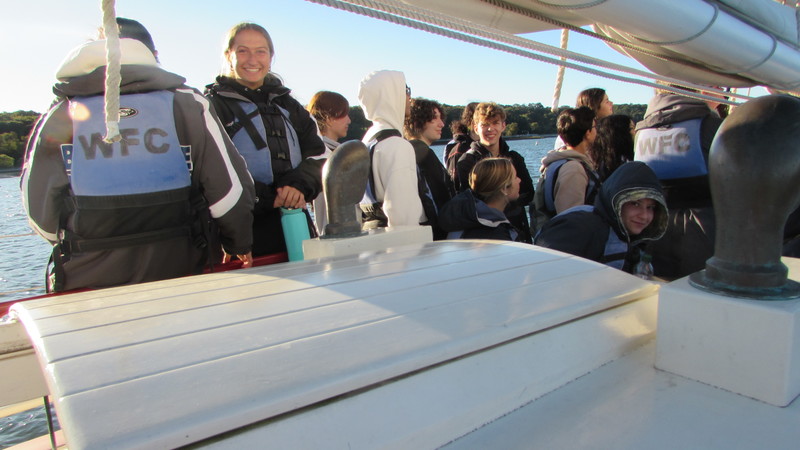 Students set sail with lifejackets with Mr. Portuese.