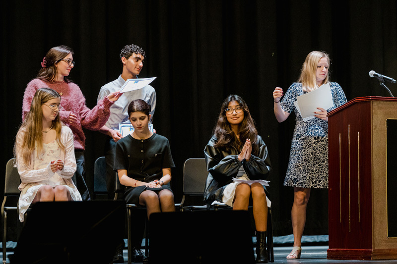 students on stage
