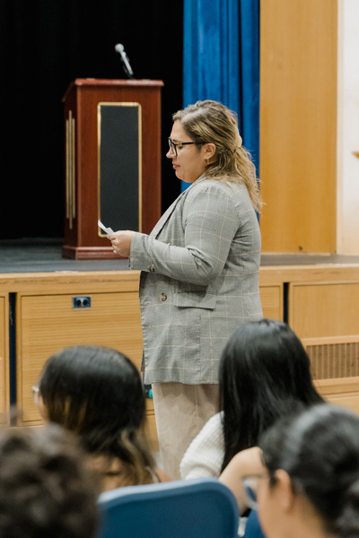 student in front of the class