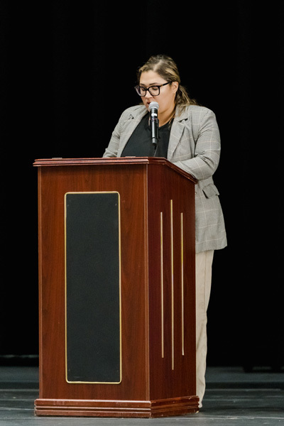 person at podium