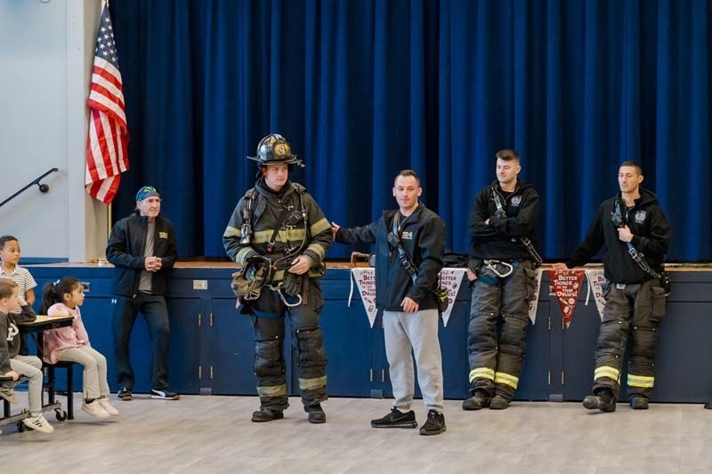 Students with firefighters