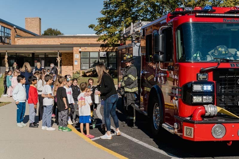 Students with firefighters