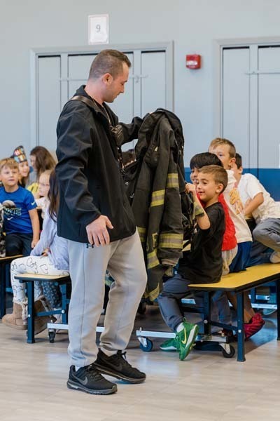 Students with firefighters