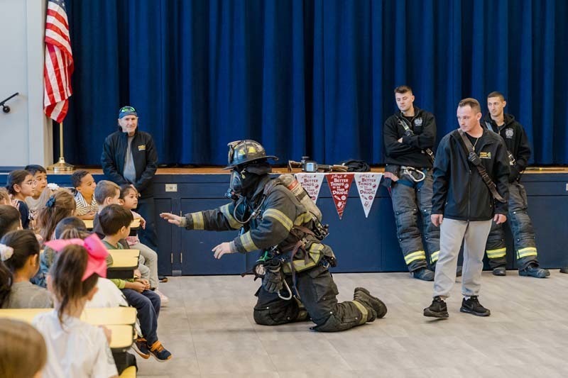 Students with firefighters