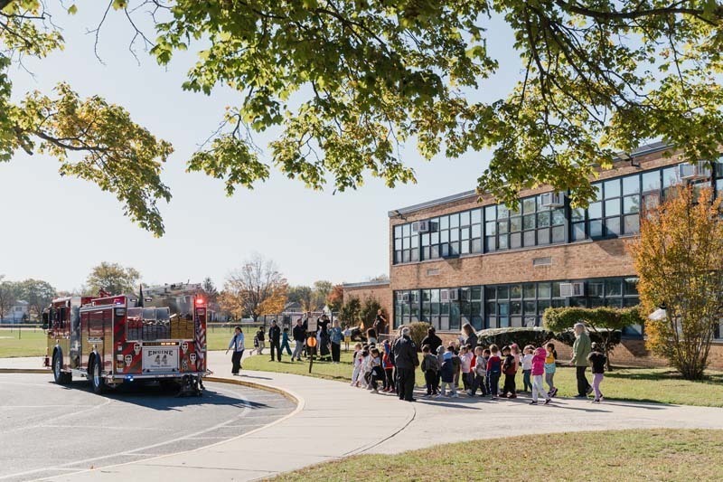 Students with firefighters