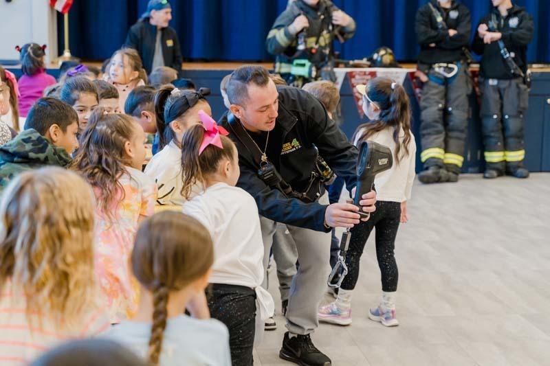 Students with firefighters