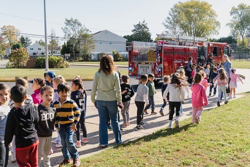 Students with firefighters