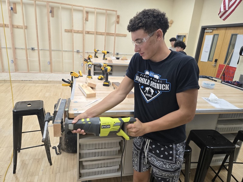 Student uses power tool during Home Improvement class at Bethpage High School.
