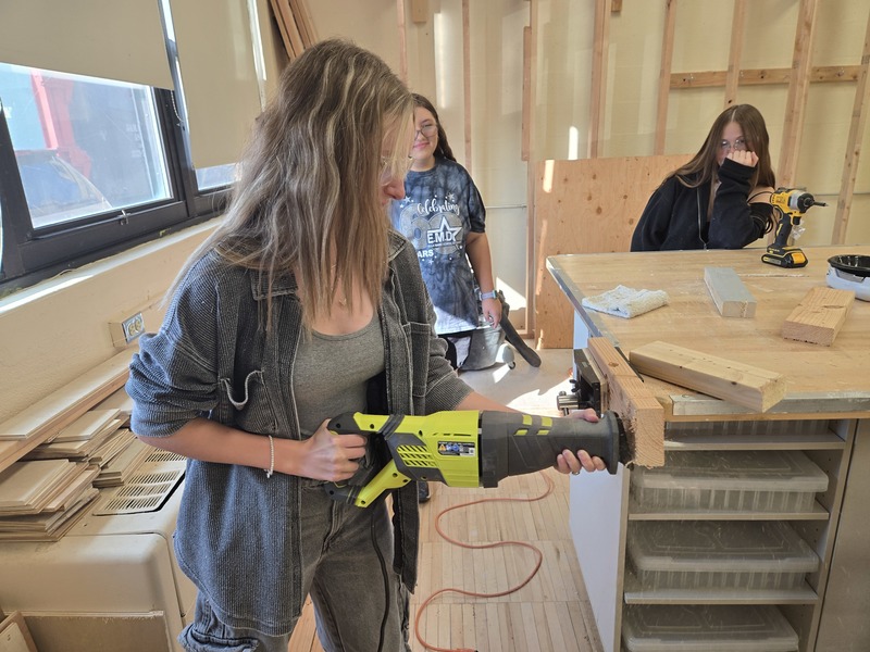 Student uses power tool during Home Improvement class at Bethpage High School.