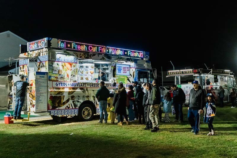 Students outside in Halloween costumes.